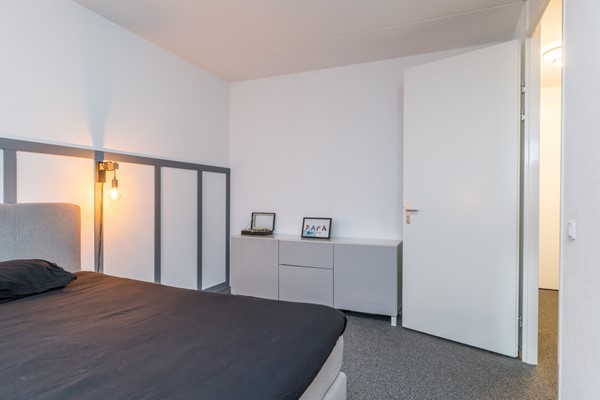 Foto - Te koop: In Landgraaf op een zeer kindvriendelijke locatie bevindt zich deze nette en moderne instapklare energiezuinige tussenwoning uit 2008